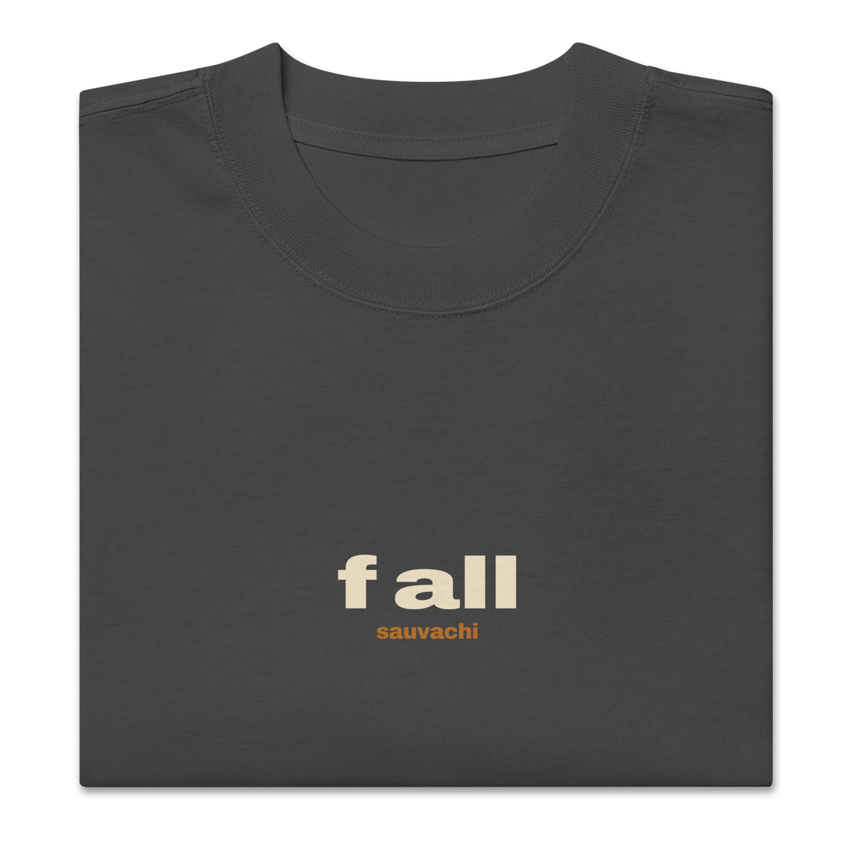 close-up of the faded black tee, folded, showing the small f all and sauvachi chest print and the collar